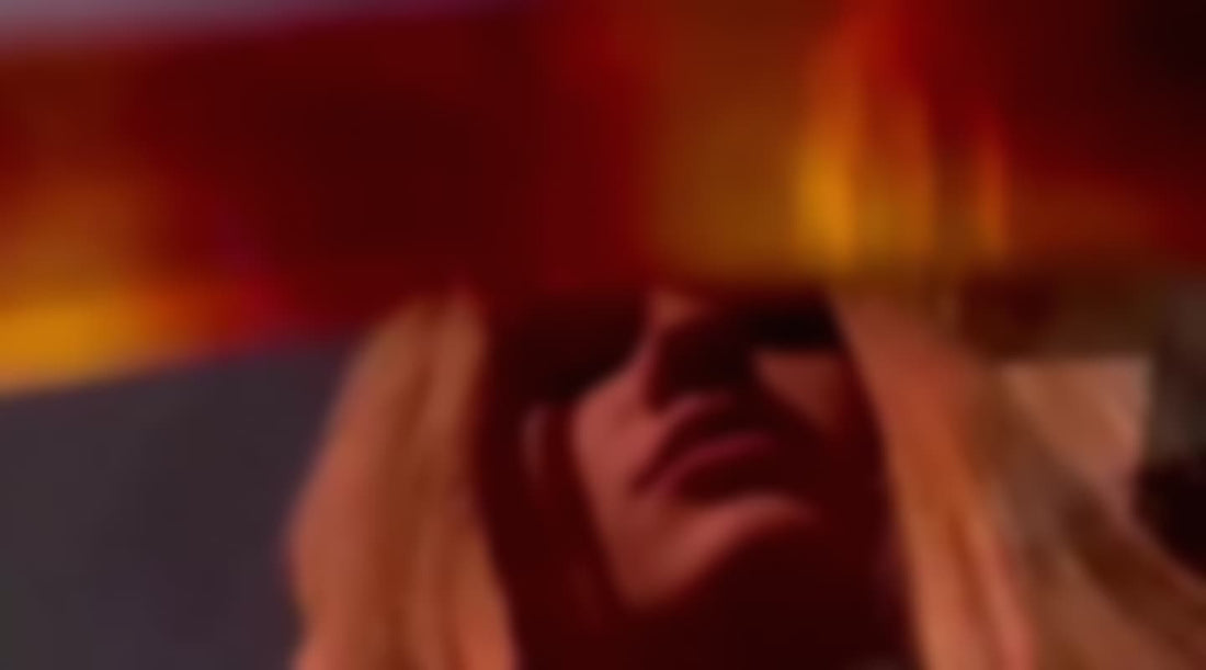 A girl wearing sunglasses.